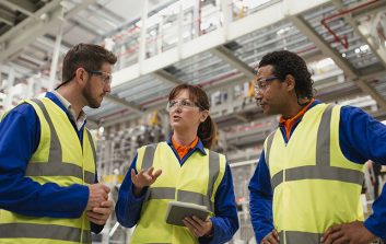 Factory Workers Having a Discussion